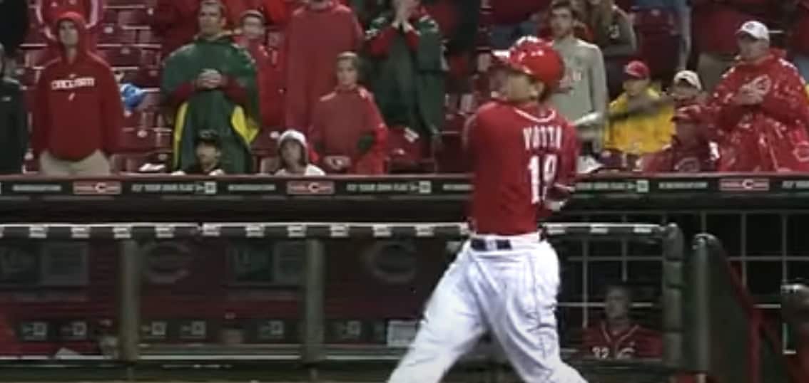 Joey Votto showcasing his batting skills, a standout in the 2010s baseball era.